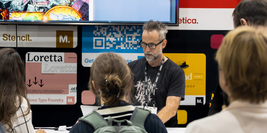 John Roshell of Swell Type and Comicraft giving a lettering demo at the Monotype booth.