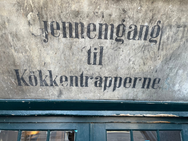 This hand-painted sign includes the curtailed “g” that has become something of a Danish design trait (also called “the Danish g”).  