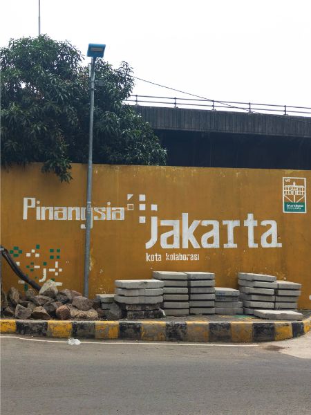 A mural depicting the Jakarta Sans typeface which has become an integral part of the city's visual identity