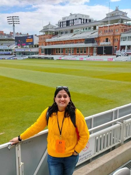 A portrait taken on Sneha at a cricket stadium.
