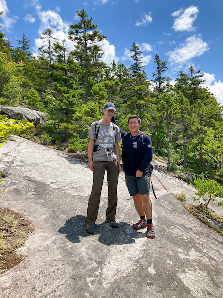 Jan Kaestner and Emin hiking in Maine.
