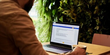 Man using Microsoft Word on Laptop Man using Microsoft Word on Laptop