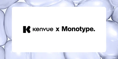 Kenvue x Monotype logo centered on a white card over a soft abstract background.