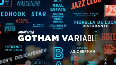 Main text centered, in white: "Introducing Gotham Variable." Dark background with neon city signs in orange, blue, and white. "Celebrating 25 years of Gotham" stamp in upper right corner in orange and white.