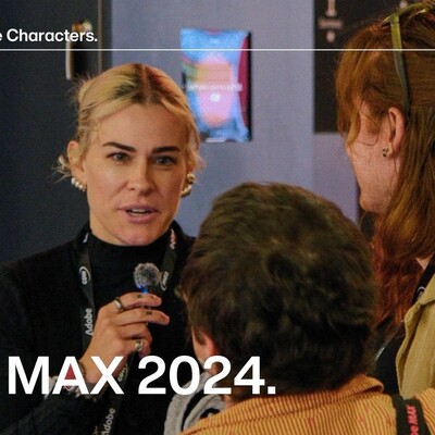 Designer Meg Lewis interviewing an attendee at Adobe MAX 2024.