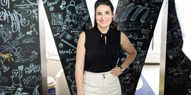 Mary Catherine Pflug portrait in front of the Monotype "M"