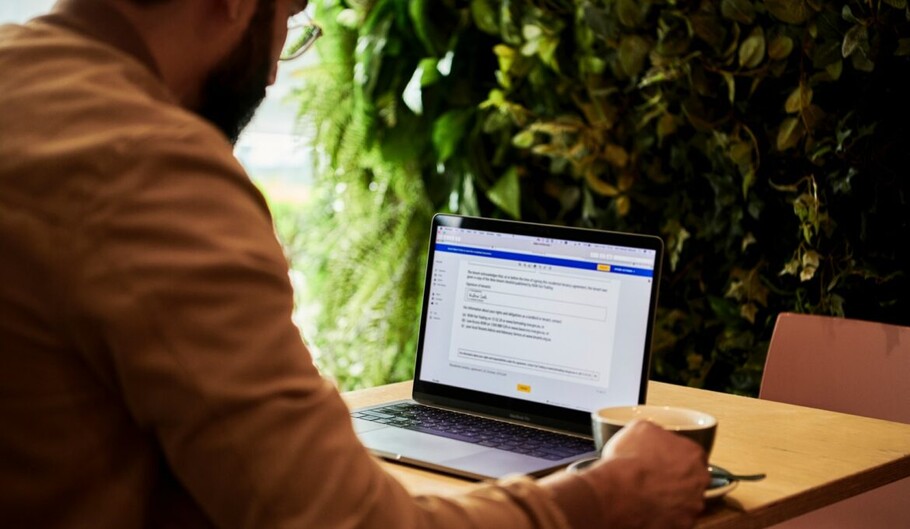 Man using Microsoft Word on Laptop Man using Microsoft Word on Laptop